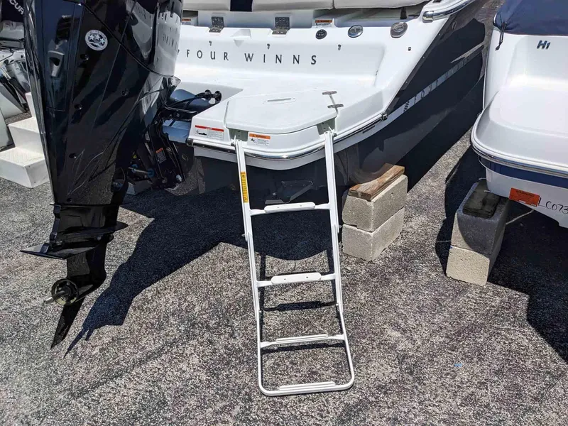 Slide: The Image of 2023 Four Winns H2 boat with extended swim platform and ladder. - 6