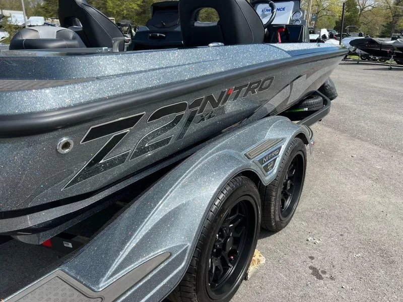 Slide: The Image of 2023 Nitro Z21 XL Pro boat on a trailer, side view. - 3