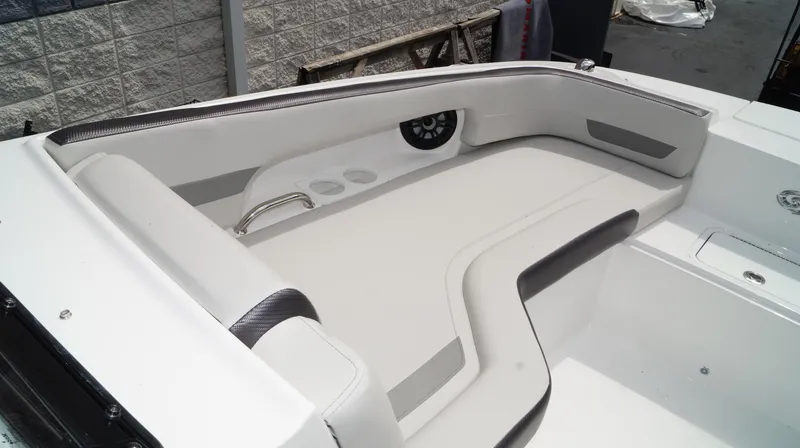 Slide: The Image of 2023 Hurricane SunDeck 235 OB boat interior seating area. - 11