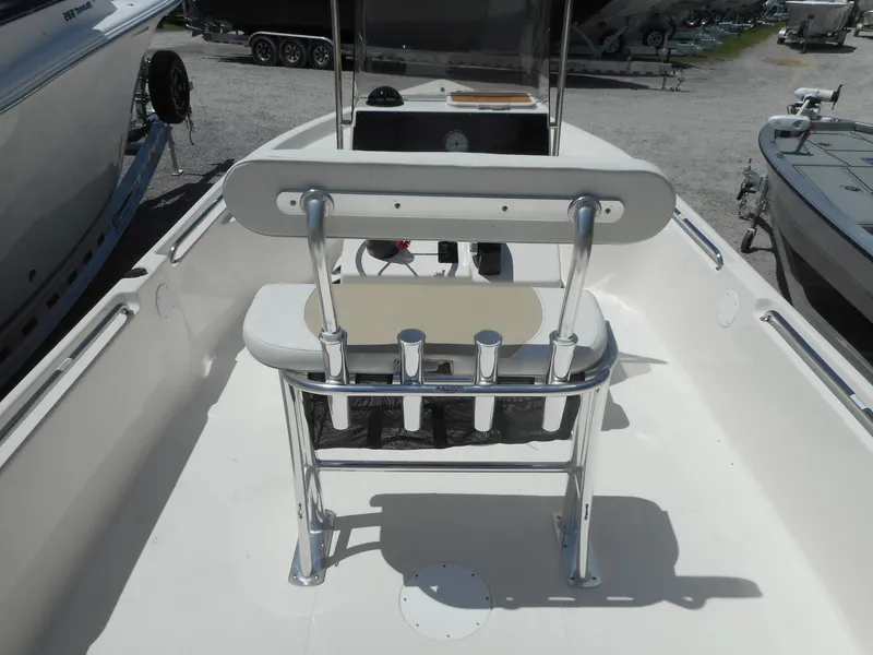 Slide: The Image of 2023 Bulls Bay 2400 boat interior with seating and rod holders. - 3