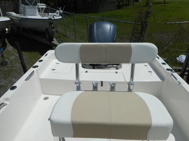 Slide: The Image of 2023 Bulls Bay 2400 boat with beige and white seating. - 4