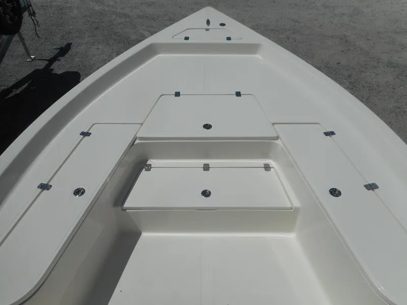Slide: The Image of 2023 Bulls Bay 2400 boat deck with storage compartments. - 6