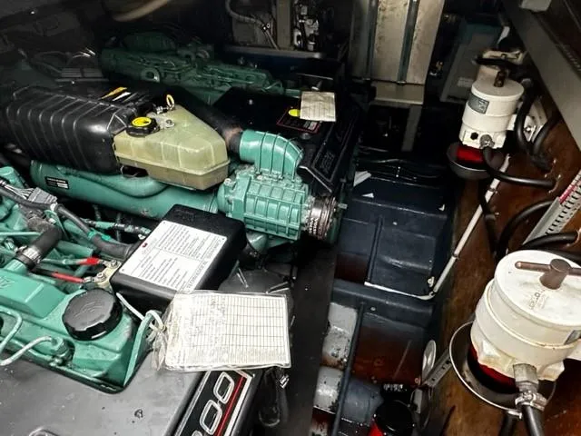 Slide: The Image of Engine room of 2005 Cranchi 37 Smeraldo yacht, showcasing mechanical components and systems. - 12