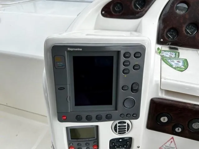 Slide: The Image of Control panel of a 2005 Cranchi 37 Smeraldo boat with Raymarine navigation system. - 18