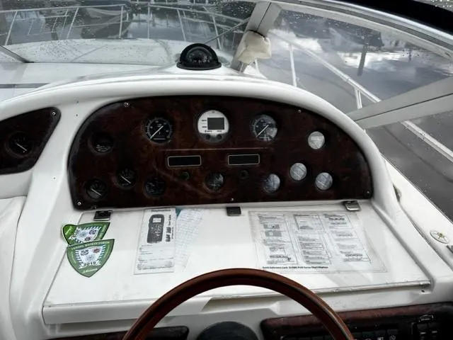 Slide: The Image of Dashboard of a 2005 Cranchi 37 Smeraldo boat with gauges and controls. - 19