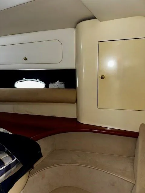 Slide: The Image of Interior cabin of 2005 Cranchi 37 Smeraldo yacht with seating and storage. - 38