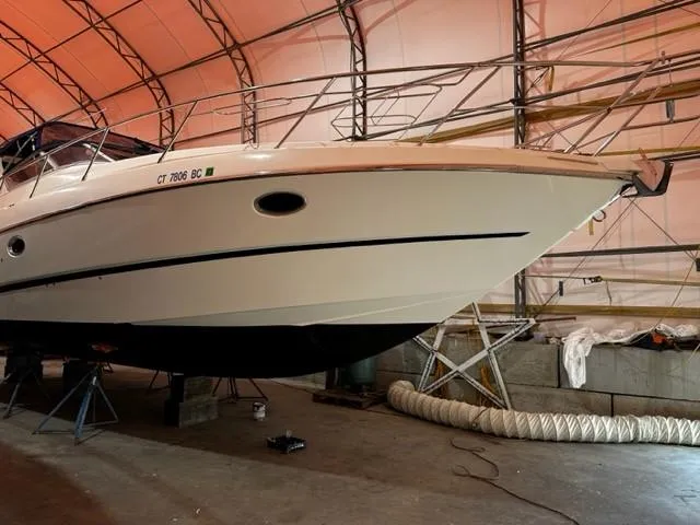 Slide: The Image of 2005 Cranchi 37 Smeraldo yacht in storage, showcasing sleek design and elegant structure. - 42