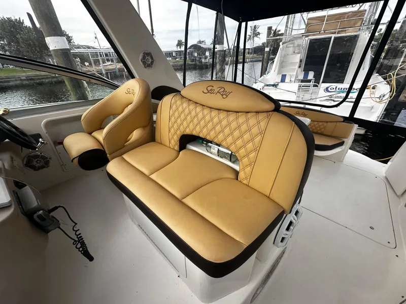 Slide: The Image of 2001 Sea Ray 340 Sundancer interior with tan leather seating. - 19