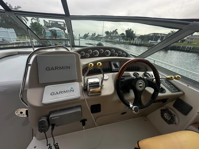 Slide: The Image of Helm of 2001 Sea Ray 340 Sundancer with Garmin navigation system. - 20