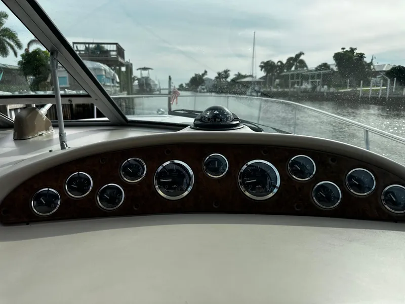 Slide: The Image of Dashboard view of a 2001 Sea Ray 340 Sundancer boat. - 25