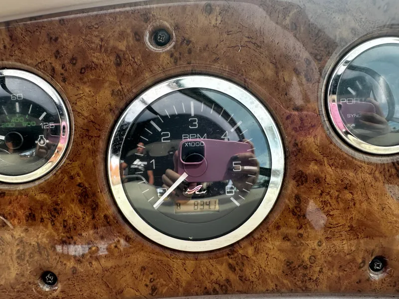 Slide: The Image of Close-up of 2001 Sea Ray 340 Sundancer boat dashboard with RPM gauge. - 27