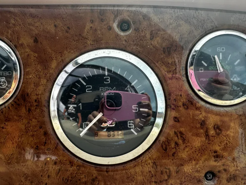 Slide: The Image of Close-up of 2001 Sea Ray 340 Sundancer boat dashboard with RPM gauge. - 28