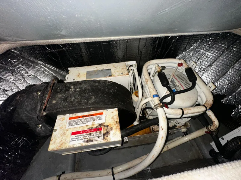 Slide: The Image of Engine compartment of a 2001 Sea Ray 340 Sundancer boat. - 45