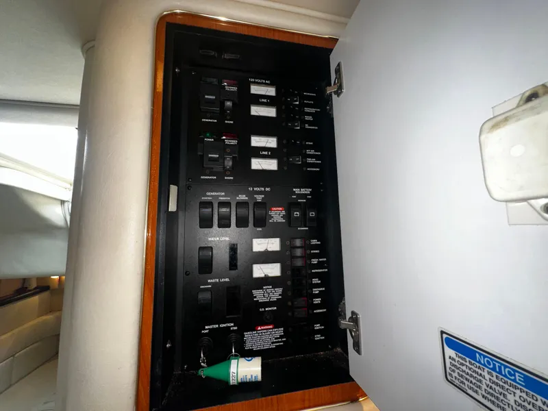 Slide: The Image of Electrical control panel on a 2001 Sea Ray 340 Sundancer boat. - 47