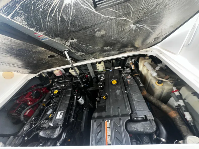Slide: The Image of Engine compartment of a 2001 Sea Ray 340 Sundancer boat. - 48
