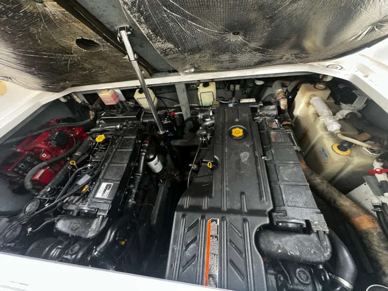Slide: The Image of Engine compartment of a 2001 Sea Ray 340 Sundancer boat. - 49