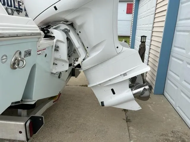 Slide: The Image of 2019 Sea Fox 328 Commander boat engine and propeller close-up. - 6