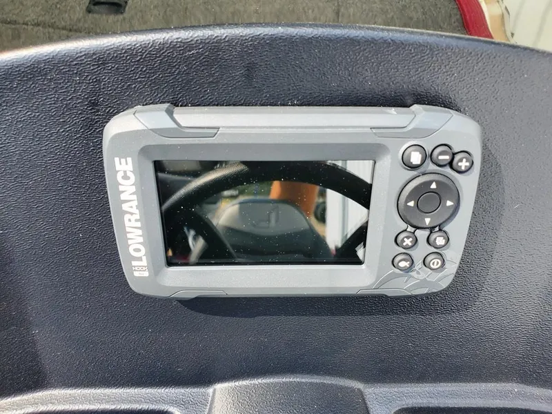 Slide: The Image of Lowrance fish finder on 2023 Lowe Skorpion 17 boat dashboard. - 11