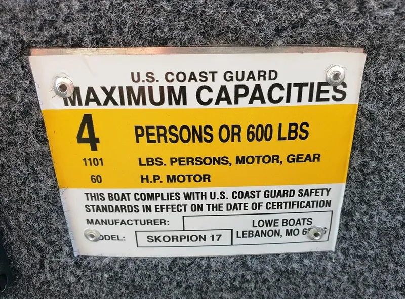Slide: The Image of 2023 Lowe Skorpion 17 boat capacity label, U.S. Coast Guard maximum capacities: 4 persons or 600 lbs. - 12