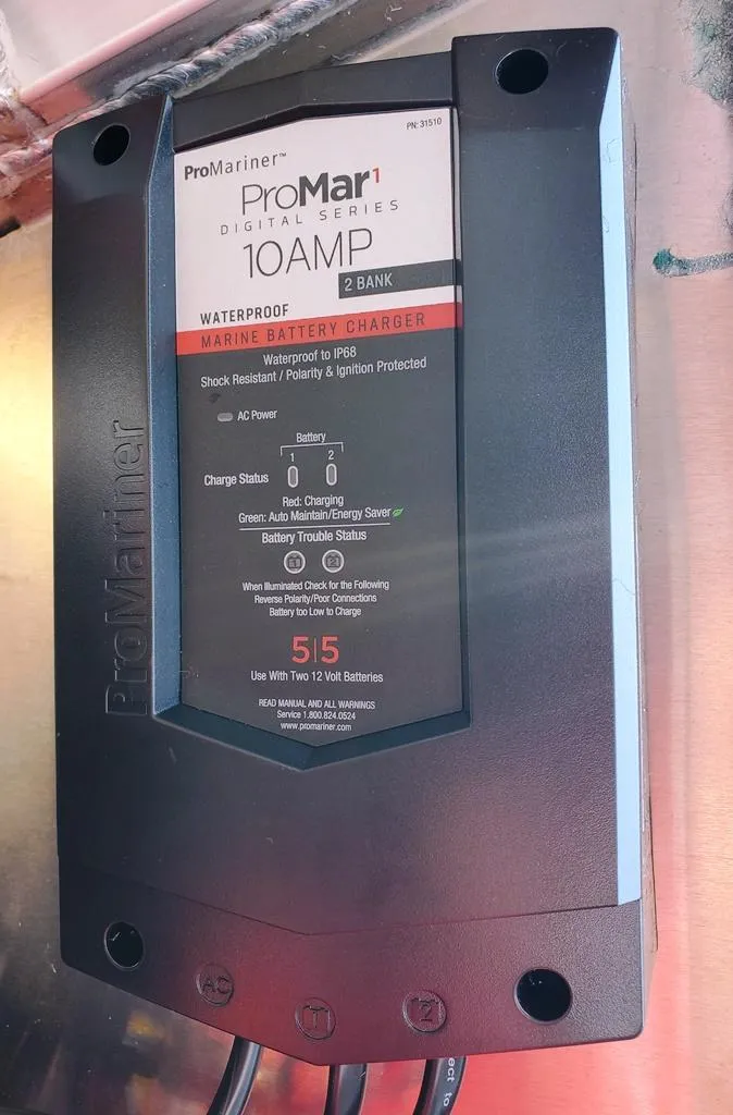 Slide: The Image of ProMariner ProMar1 10AMP marine battery charger on a 2023 Lowe Skorpion 17 boat. - 13
