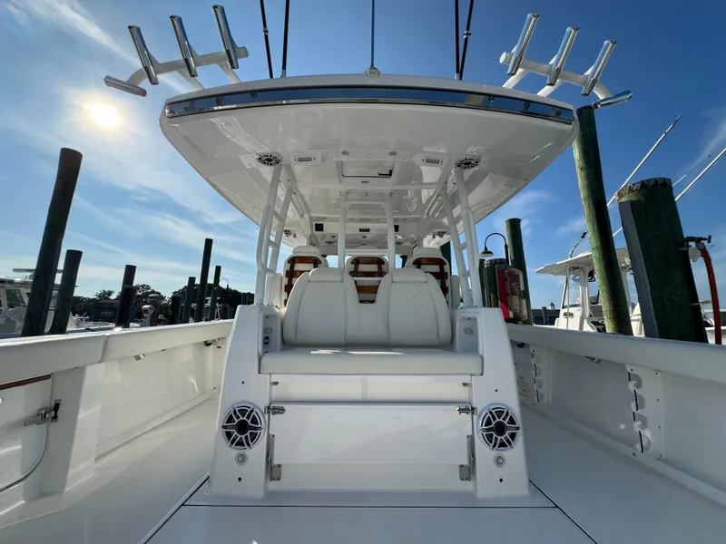 Slide: The Image of 2024 Everglades 395 Center Console boat, featuring spacious deck and modern design. - 30