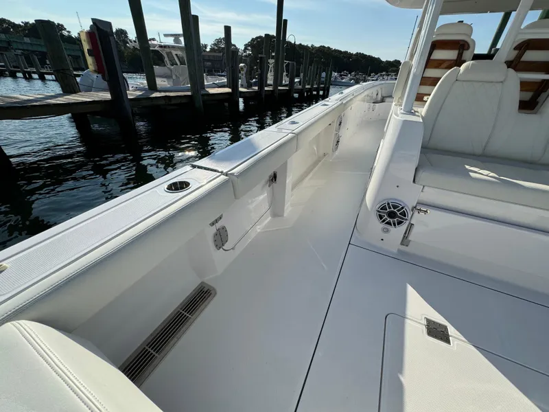 Slide: The Image of 2024 Everglades 395 Center Console boat interior, docked at marina. - 32