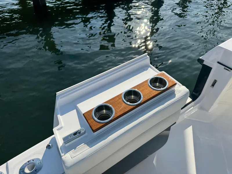 Slide: The Image of 2024 Everglades 395 Center Console boat with cup holders on deck. - 34