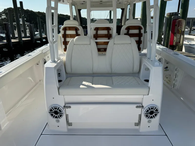 Slide: The Image of 2024 Everglades 395 Center Console boat with luxurious seating and modern design. - 38