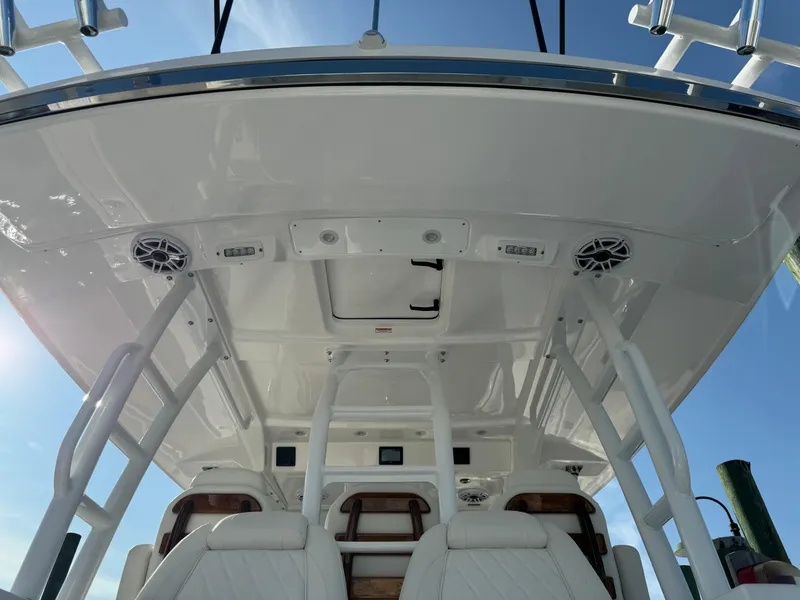 Slide: The Image of 2024 Everglades 395 Center Console boat interior with seating and speakers. - 40