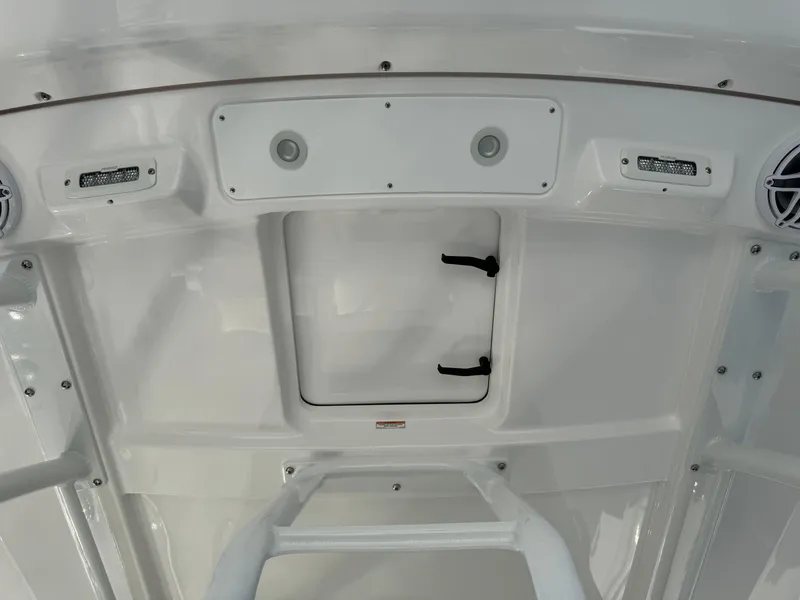 Slide: The Image of 2024 Everglades 395 Center Console boat interior ceiling with speakers and hatch. - 46