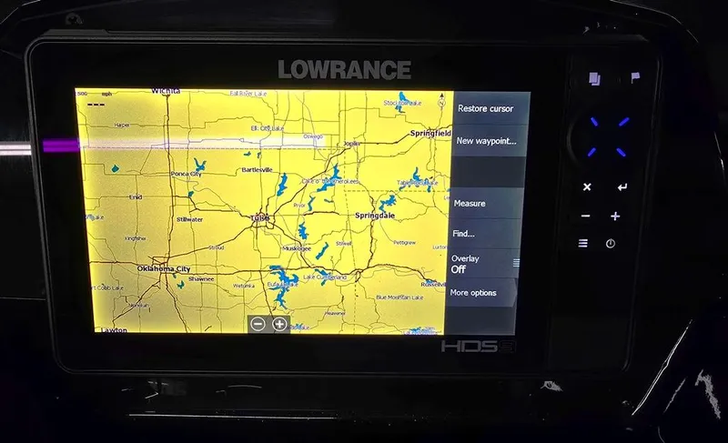 Slide: The Image of Lowrance HDS display showing a detailed map on a 2023 Lowe Stinger 188 boat. - 14