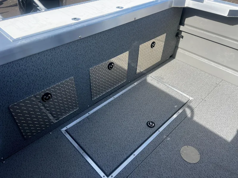 Slide: The Image of 2023 Thunder Jet 21 Chinook OS boat interior with storage compartments. - 20