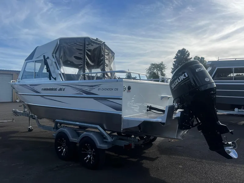 Slide: The Image of 2023 Thunder Jet 21 Chinook OS boat with Suzuki outboard motor on trailer. - 3