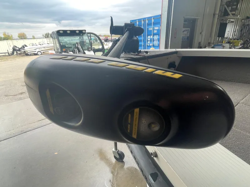 Slide: The Image of 2004 Crestliner 1700 SUPER HAWK boat interior with carpeted floor and storage compartments. - 12