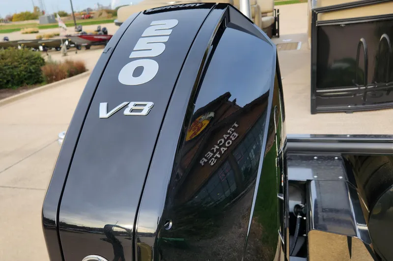 Slide: The Image of Close-up of a 2023 Regency 230 LE3 boat's 250 V8 engine. - 3