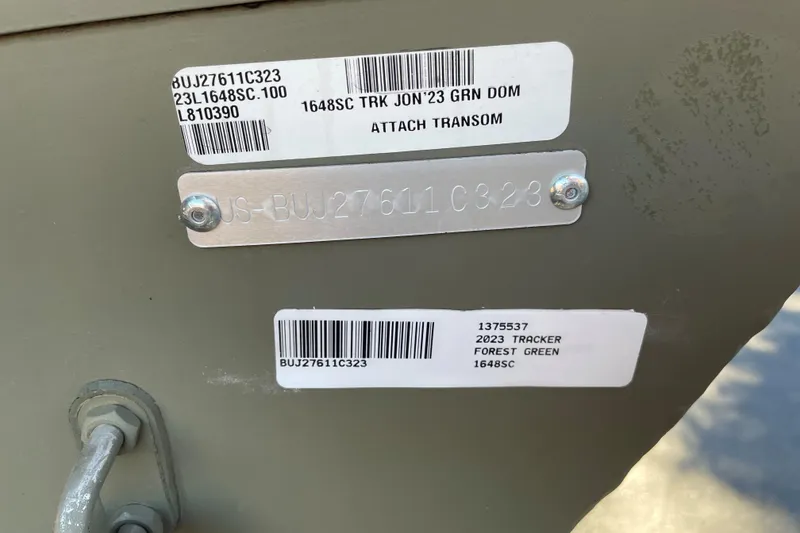Slide: The Image of 2023 Tracker Grizzly 1648 SC boat identification tags and labels in forest green. - 32