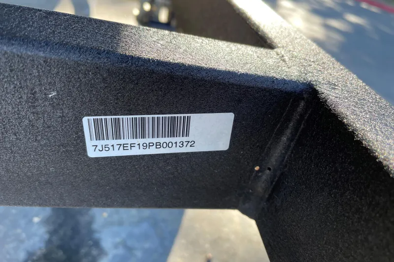 Slide: The Image of 2023 Tracker Grizzly 1648 SC with visible barcode and serial number. - 34
