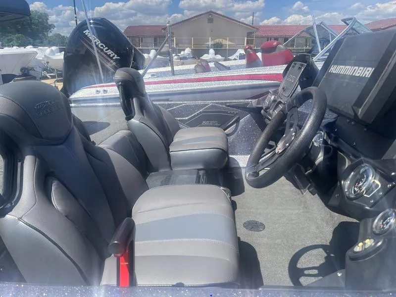 Slide: The Image of 2021 Skeeter ZXR 20 boat interior with Humminbird electronics and Mercury engine. - 5