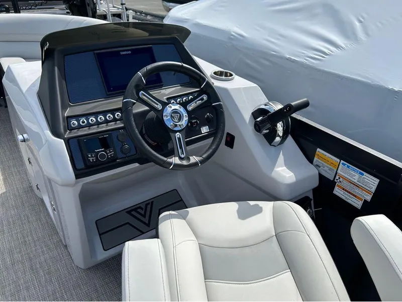 Slide: The Image of 2023 Viaggio D23U boat dashboard with steering wheel and controls. - 3
