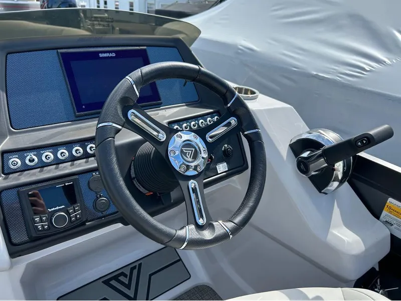 Slide: The Image of Viaggio D23U 2023 boat dashboard with steering wheel and control panel. - 5