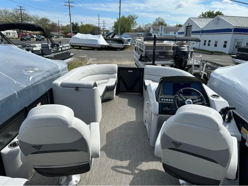 Slide: The Image of 2023 Viaggio D23U pontoon boat interior with modern seating and control panel. - 6