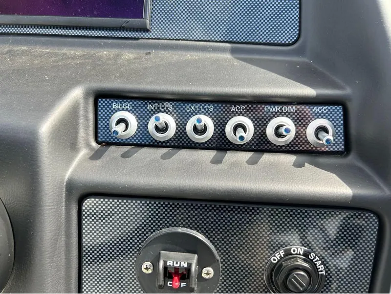 Slide: The Image of Control panel of 2023 Viaggio D23U with labeled switches and ignition. - 9