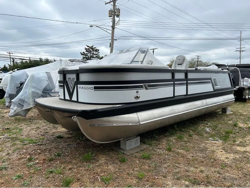 The Image of 2023 Viaggio D23U pontoon boat on display outdoors. - 1
