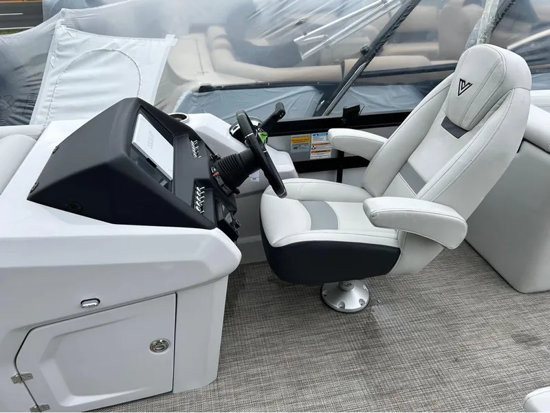 Slide: The Image of 2023 Viaggio D23U boat interior with modern helm and comfortable captain's chair. - 12