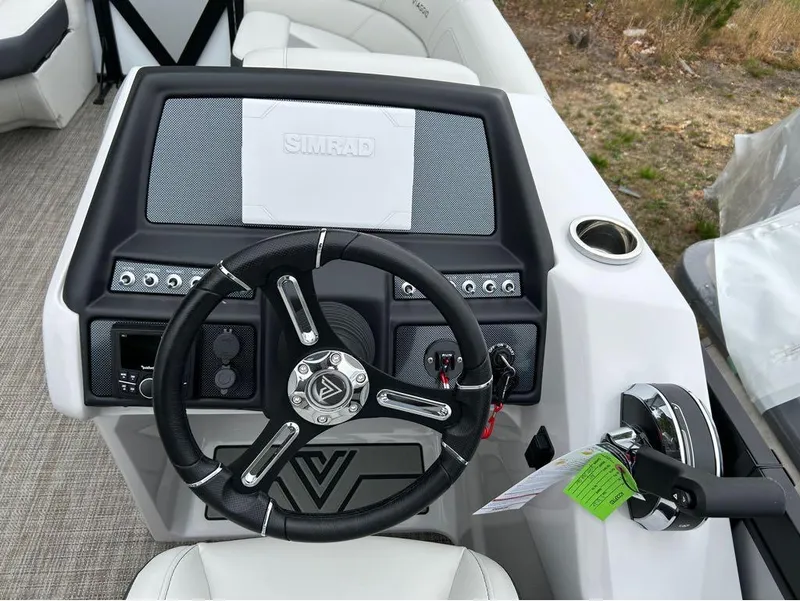 Slide: The Image of 2023 Viaggio D23U boat dashboard with steering wheel and control panel. - 16
