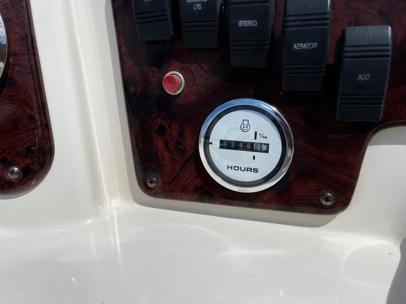 Slide: The Image of Close-up of a 2008 Sweetwater SW2186RE4 boat dashboard with hour meter reading 2468. - 10