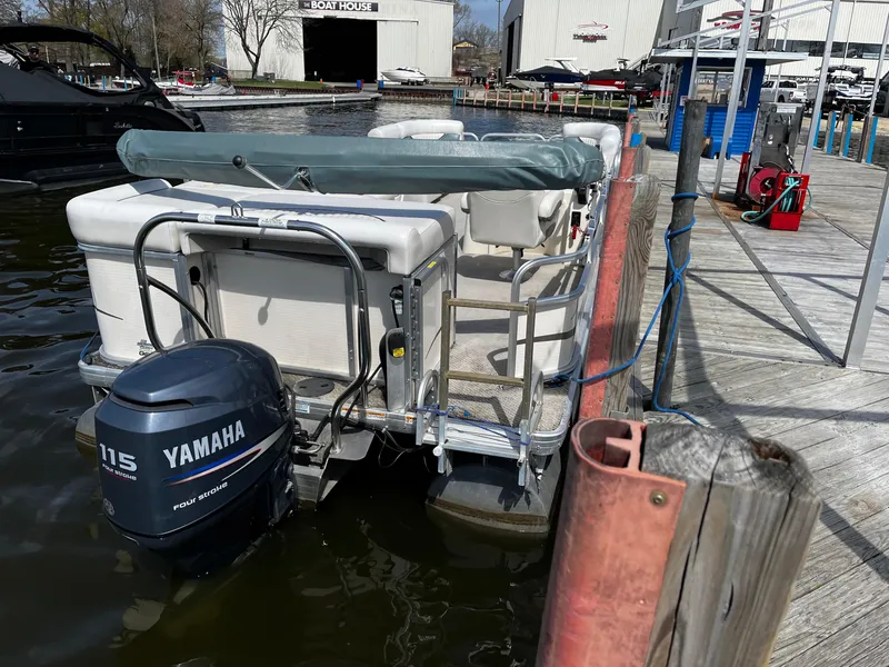 Slide: The Image of 2008 Sweetwater SW2186RE4 pontoon boat docked with Yamaha 115 engine. - 4
