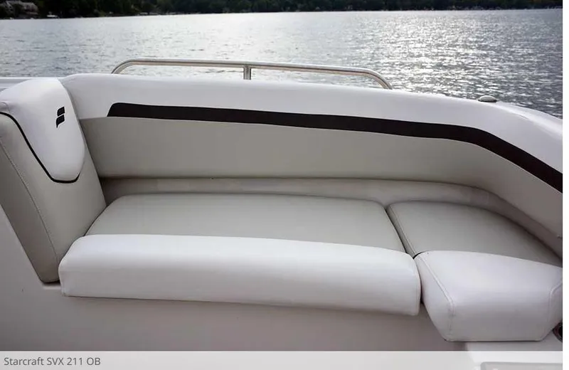 Slide: The Image of 2023 Starcraft SVX211 boat interior seating with lake view. - 9