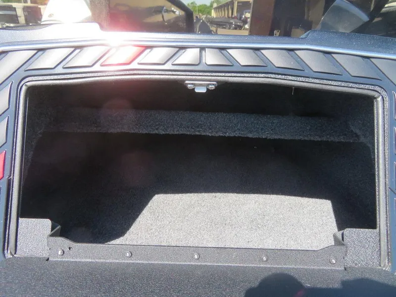 Slide: The Image of 2023 Vexus VX20 boat storage compartment with carpeted interior. - 18