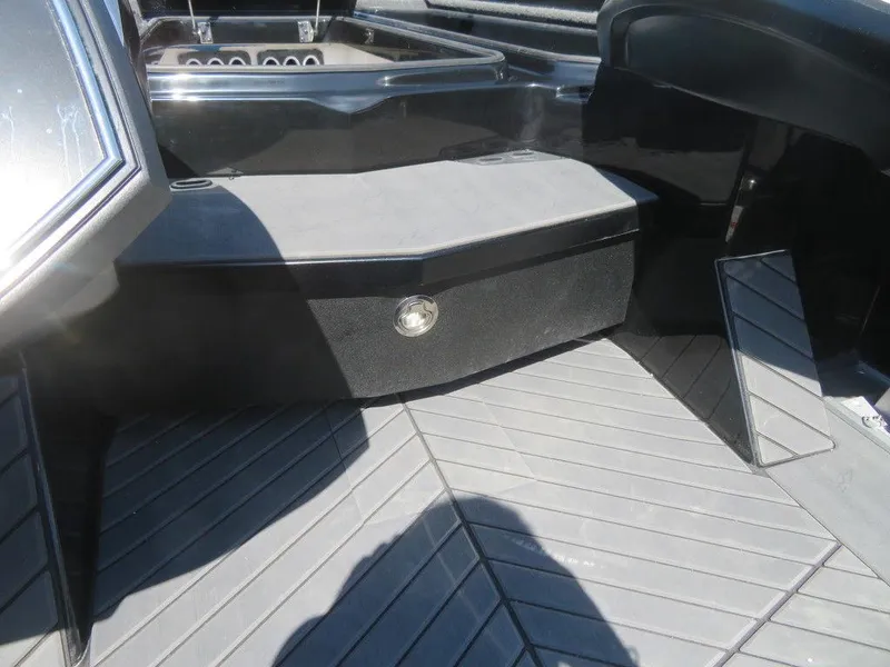 Slide: The Image of 2023 Vexus VX20 boat interior storage compartment and deck. - 19